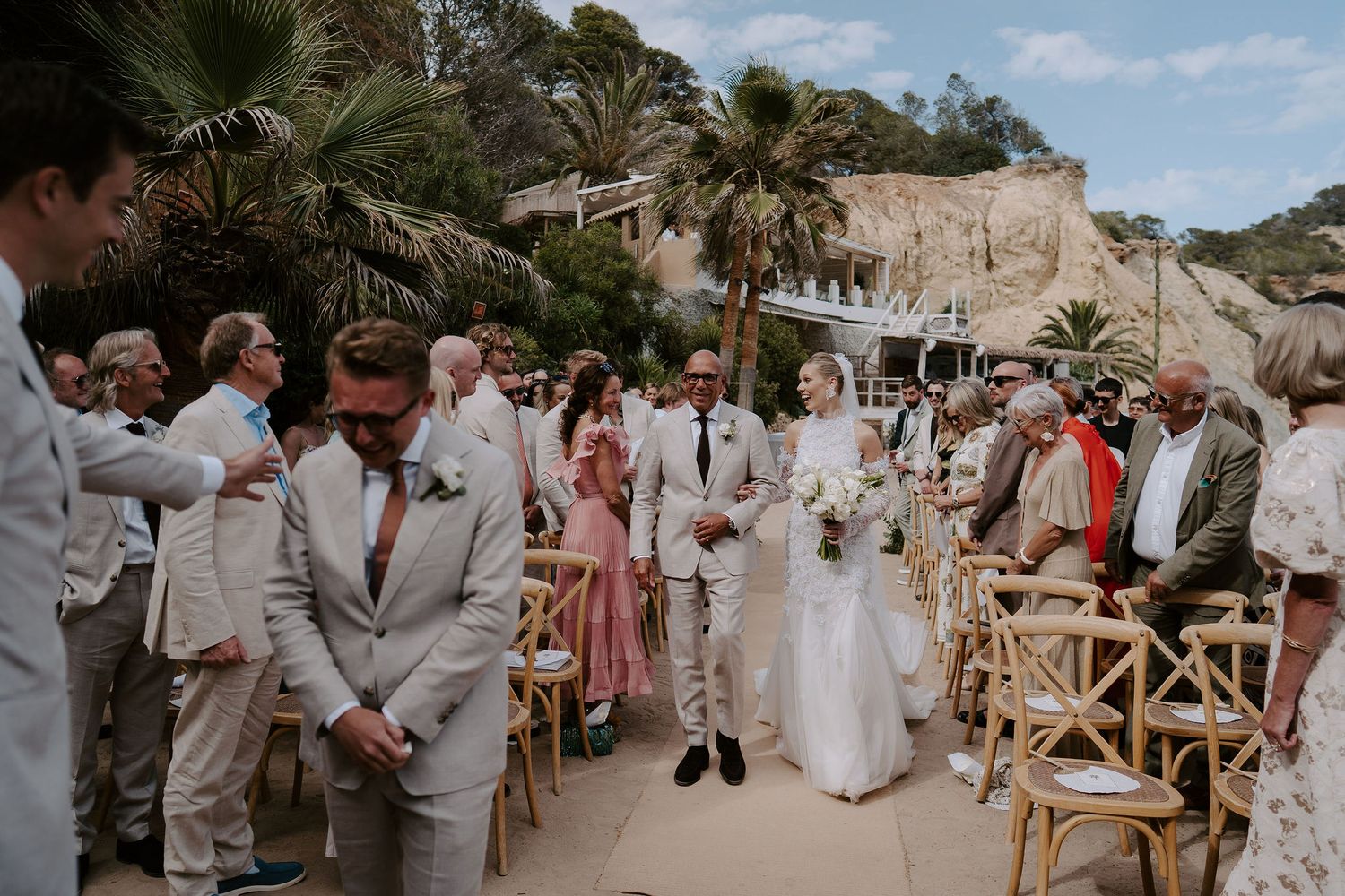 father of bride and bride walking down aisle to the crying groom at amante ibiza