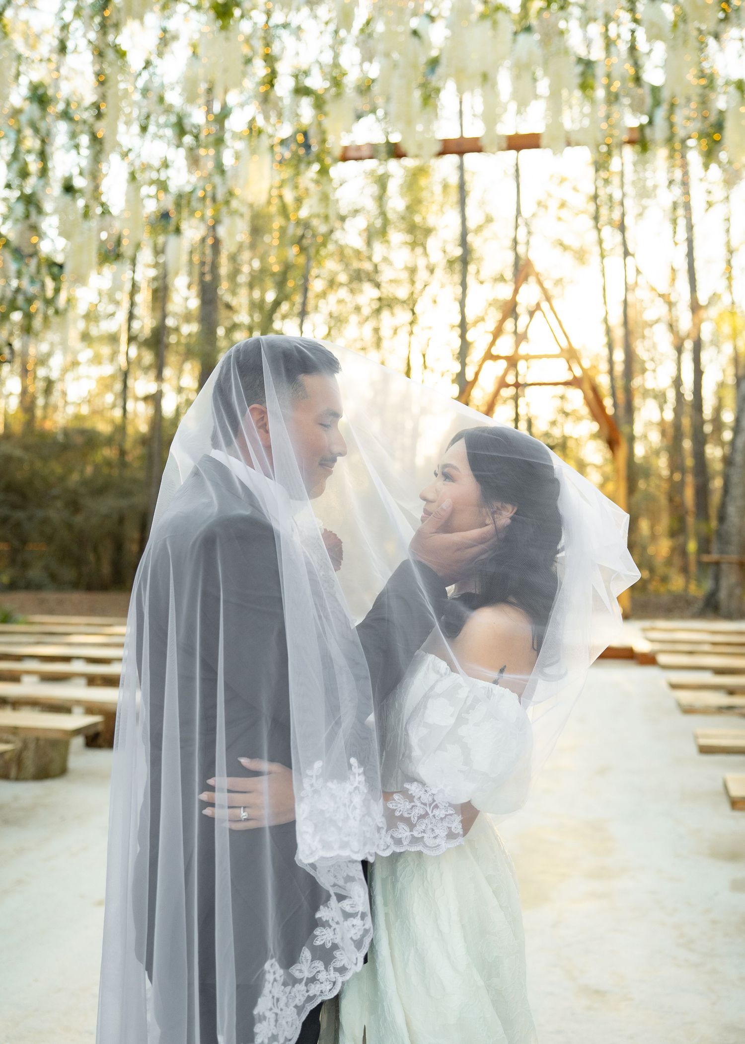Barrillas Family elopement in Redwicks woods, Montgomery TX, surrounded by tall trees at twilight