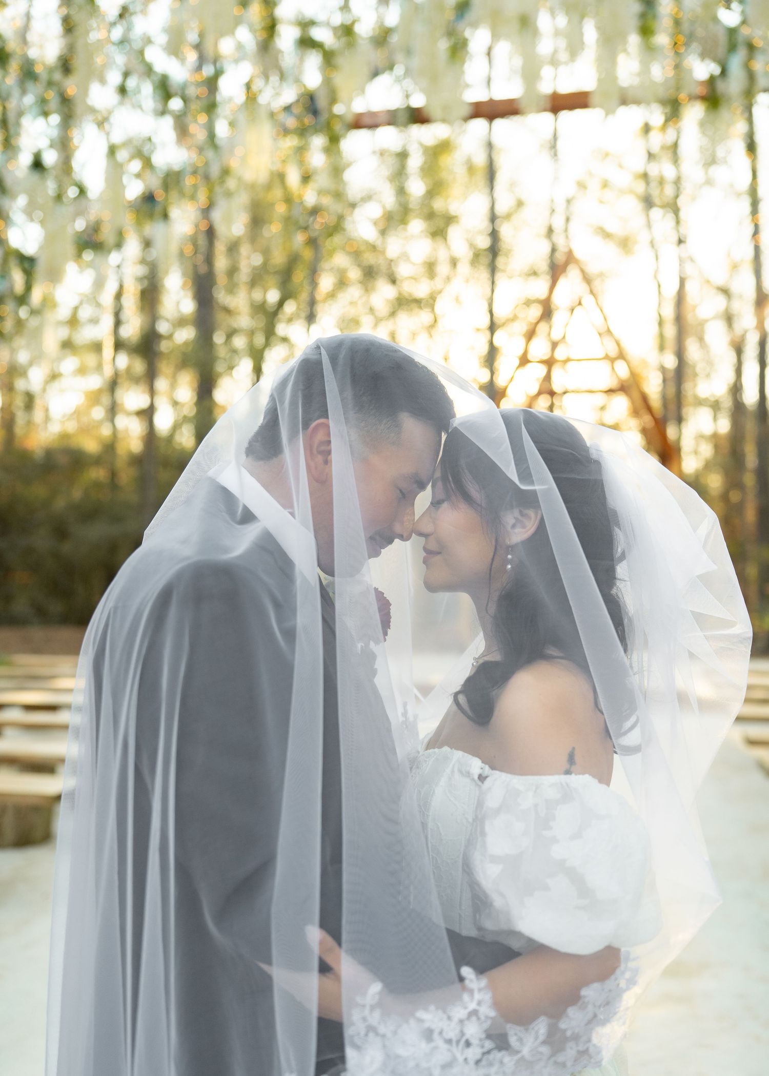 Barrillas Family elopement in Redwicks woods, Montgomery TX, surrounded by tall trees at twilight