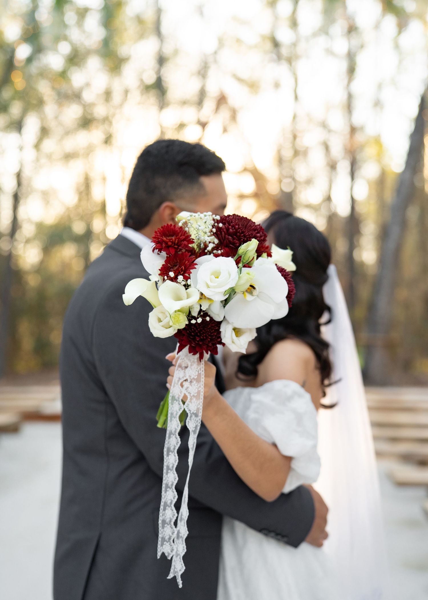 Barrillas Family elopement in Redwicks woods, Montgomery TX, surrounded by tall trees at twilight