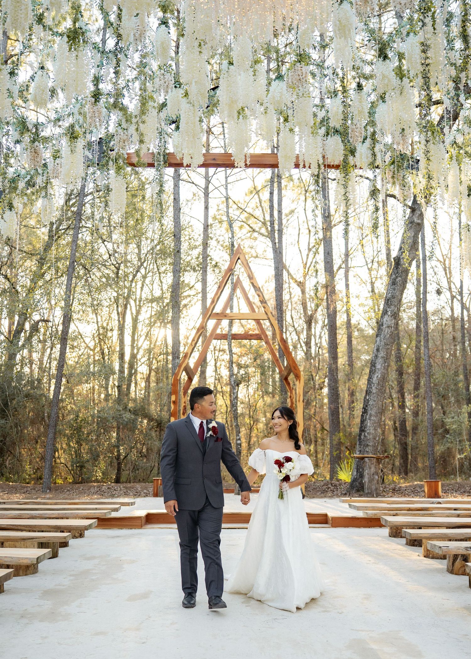 Twilight elopement ceremony of the Barrillas Family in Montgomery TX, with warm, moody light
