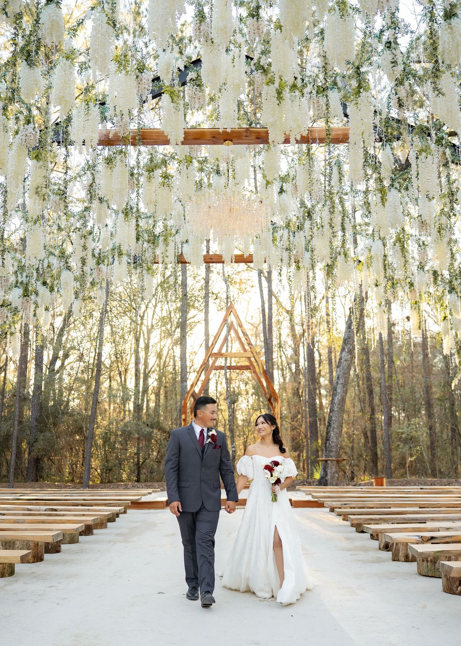Twilight elopement ceremony of the Barrillas Family in Montgomery TX, with warm, moody light