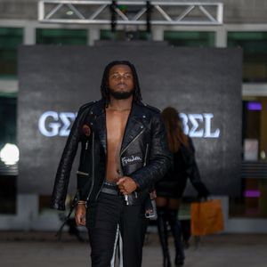 Models present black leather jackets and pants collection at Columbia Museum of Art fashion show.