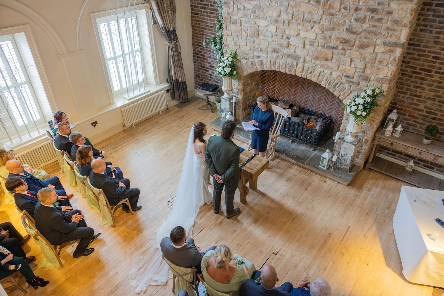 Looking down at the ceremony at Hardwick Hall Hotel. Photo by Casual Captures Wedding Photography