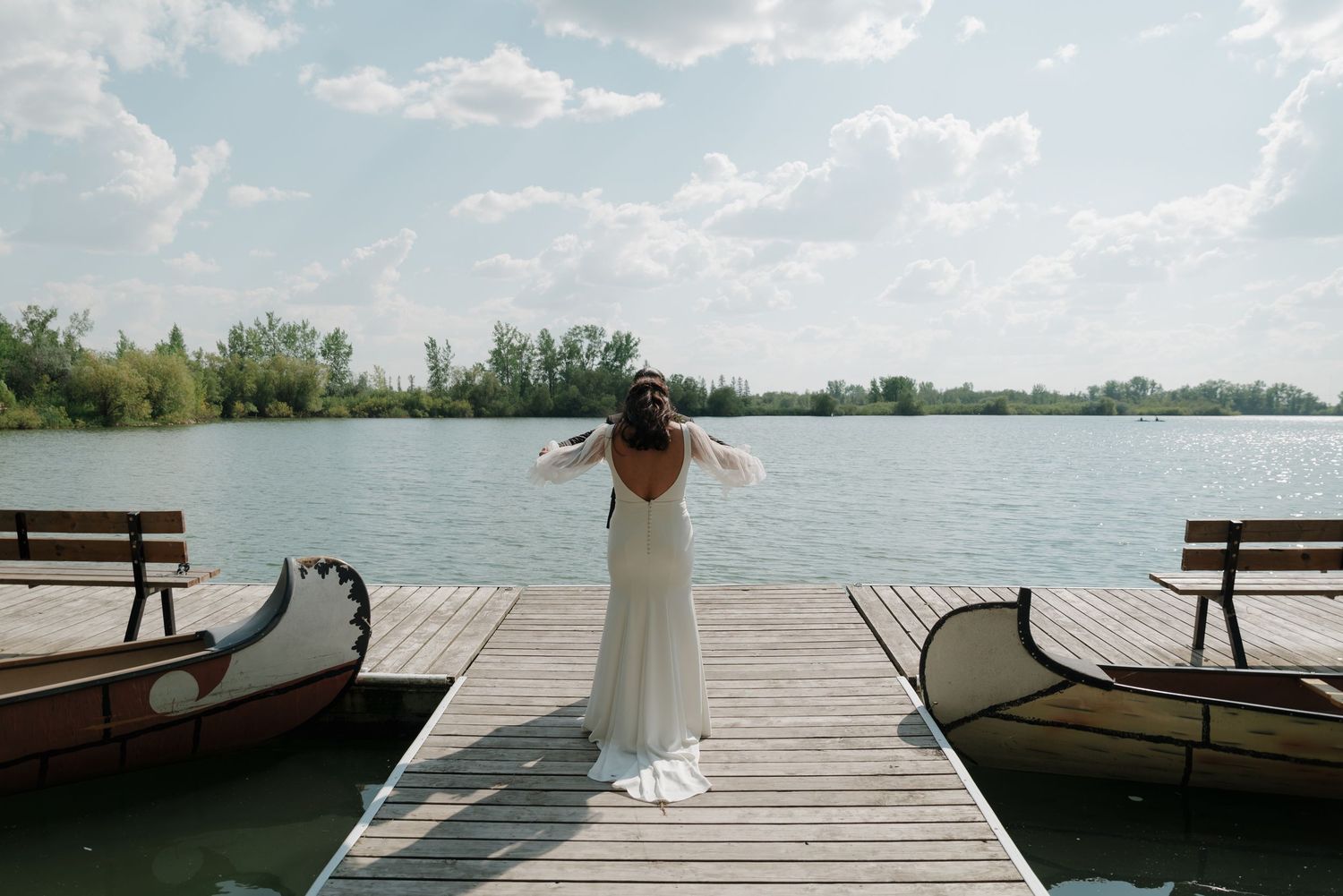 A collection of wedding photos showing a wooden dock over a lake with benches and scenic water views.