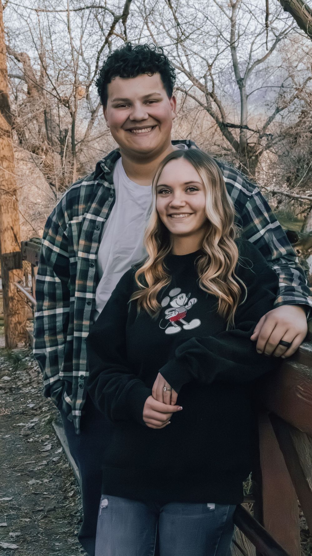 Engaged couple posing together during a lifestyle engagement photography session
