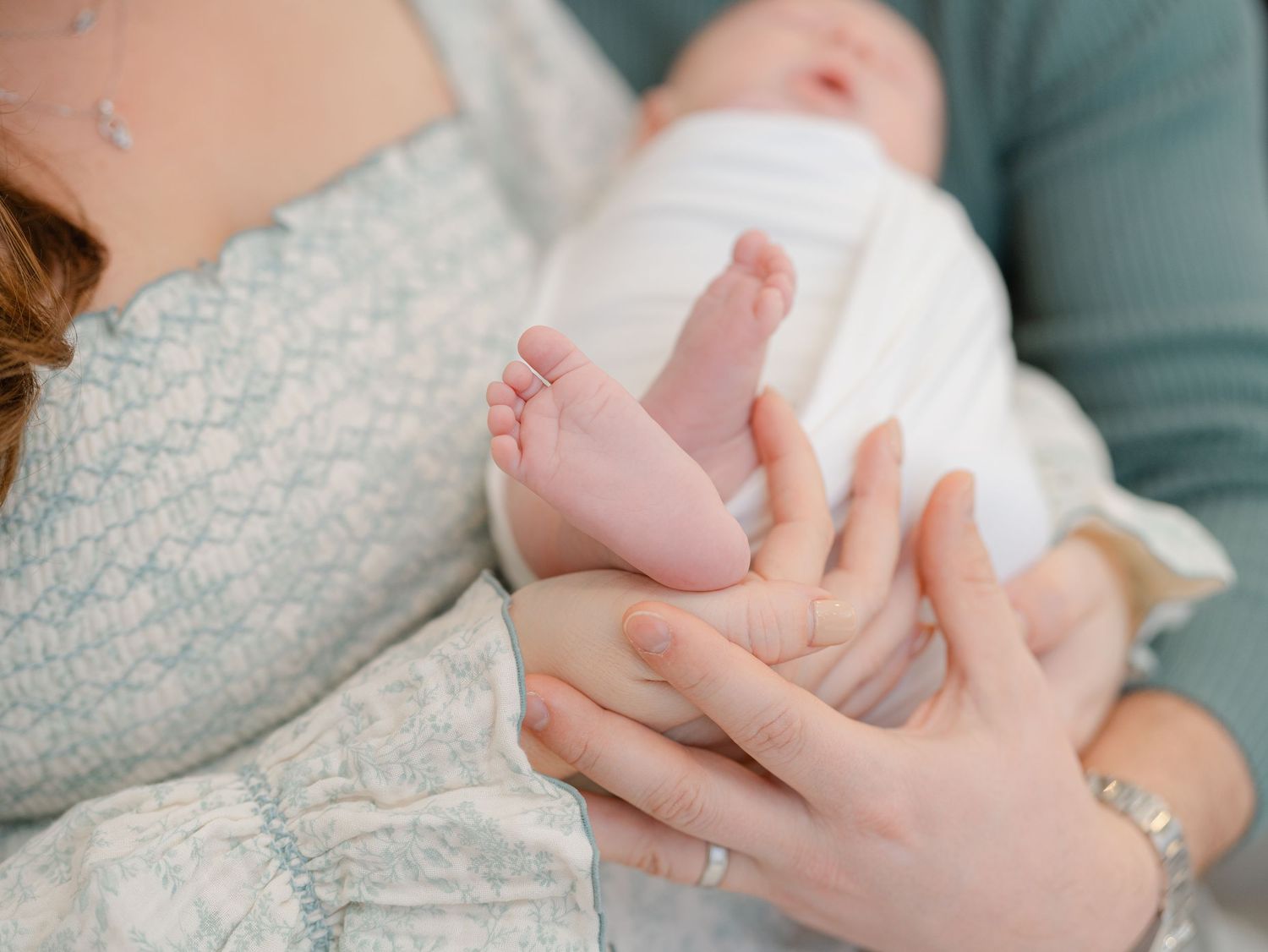 Close-up detail of newborn toes, lifestyle newborn photography NJ.