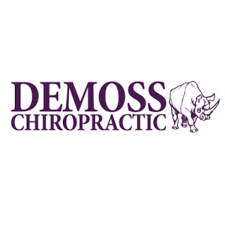A chiropractic clinic logo featuring a butterfly design and purple text spelling out 'Demoss Chiropractic'.