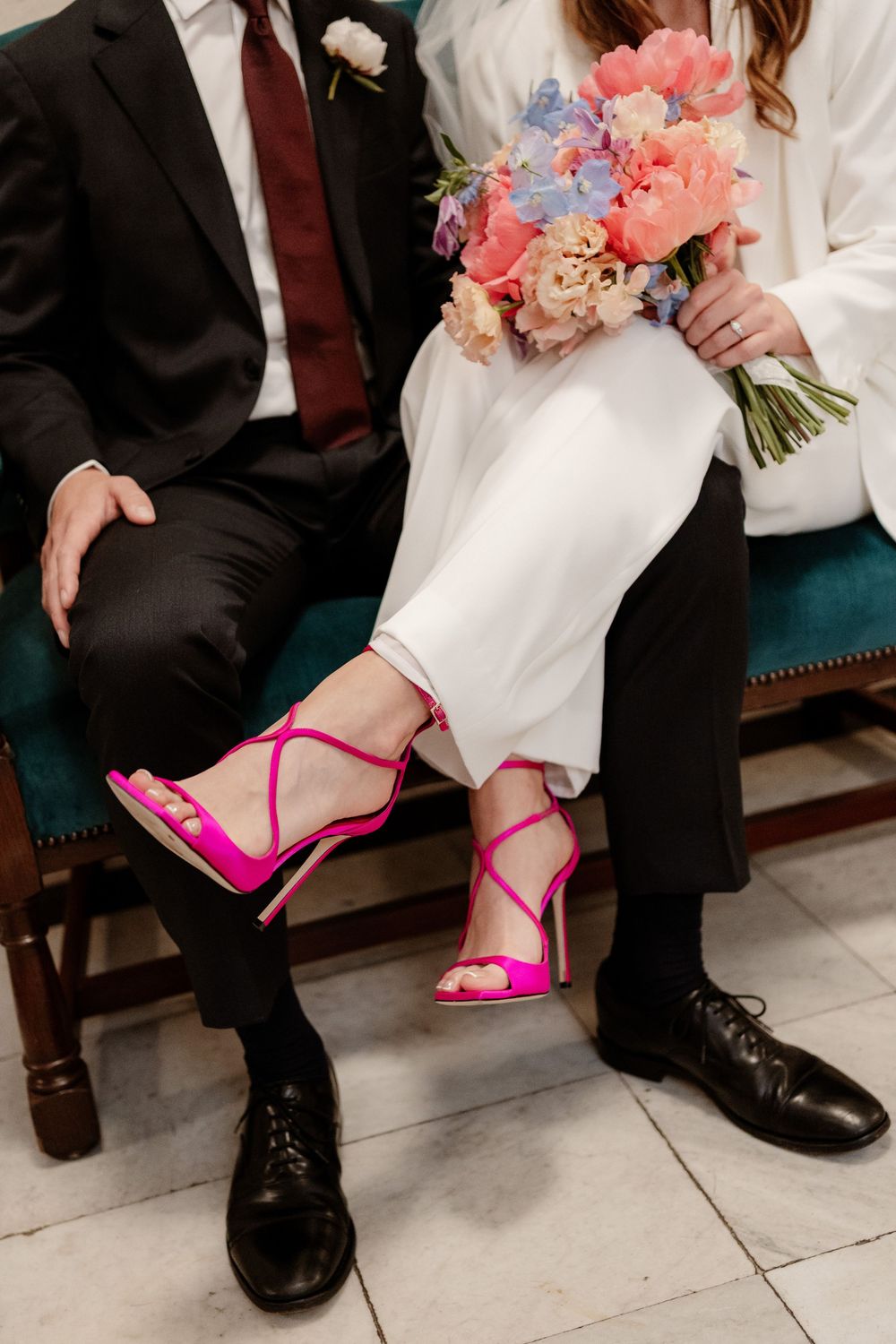 A series of photos showing bright pink high heels next to formal black dress shoes against a white floor.