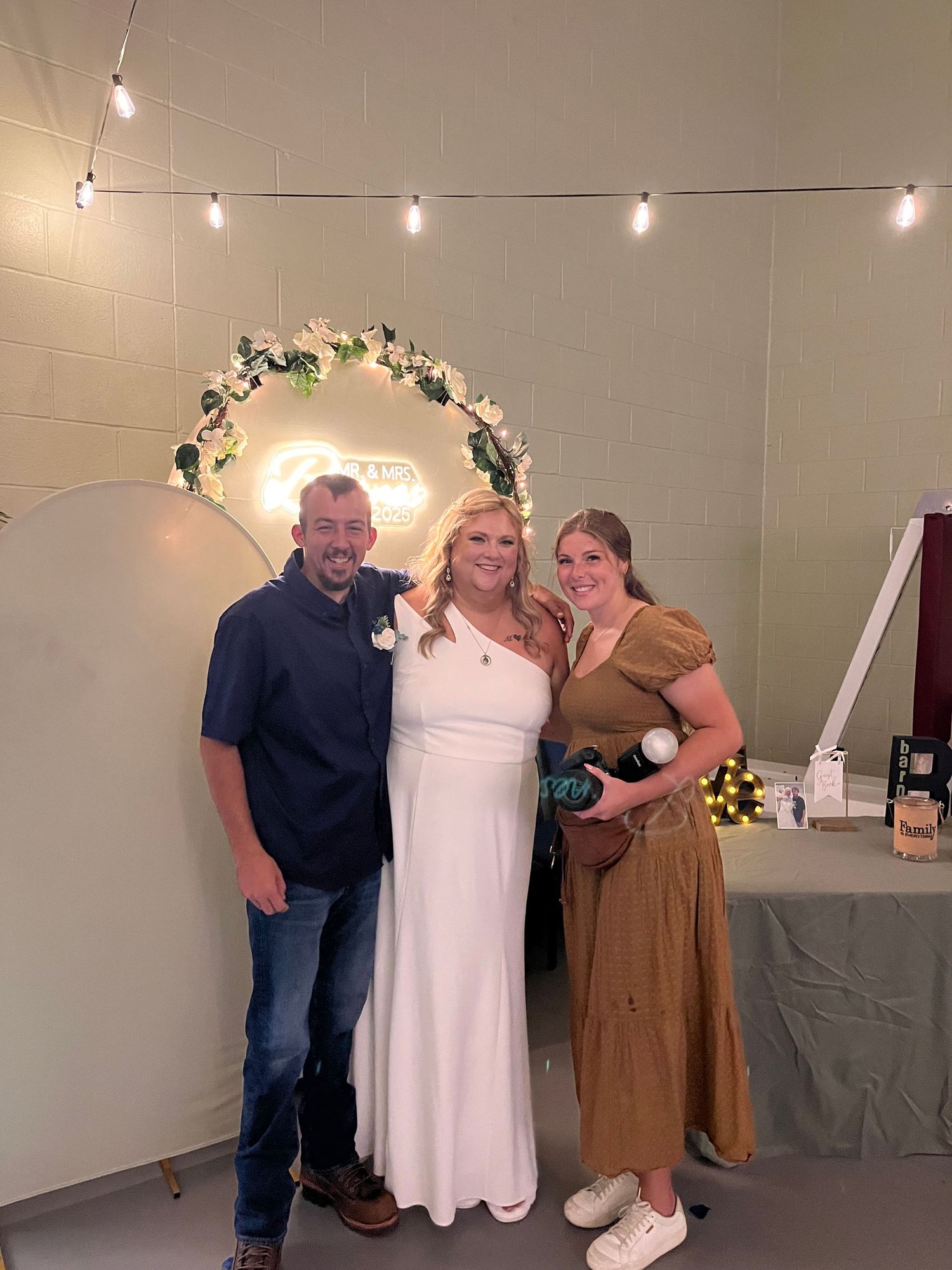 The photographer with her couples.