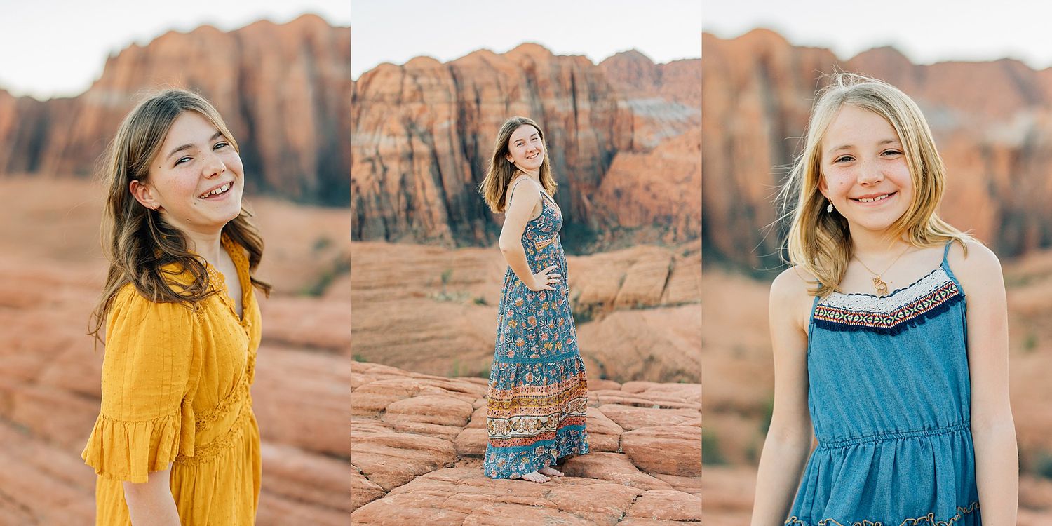 People in coordinated outfits pose against stunning red rock formations in a desert landscape at sunset.