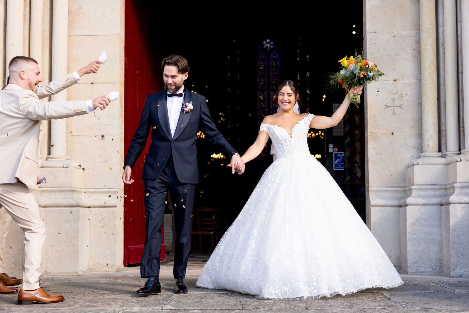 Newlyweds share joyful dance moves in a series of candid wedding celebration photos.