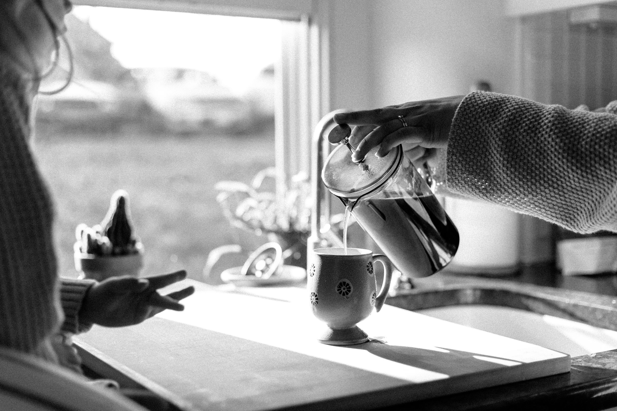 Silhouettes against bright windows create a moody black and white photographic series.