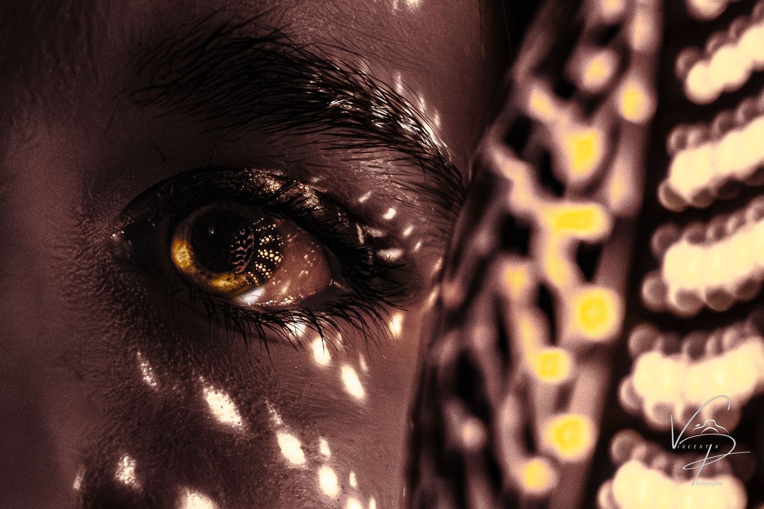 Artistic light patterns creating abstract shadows and illumination on a surface.