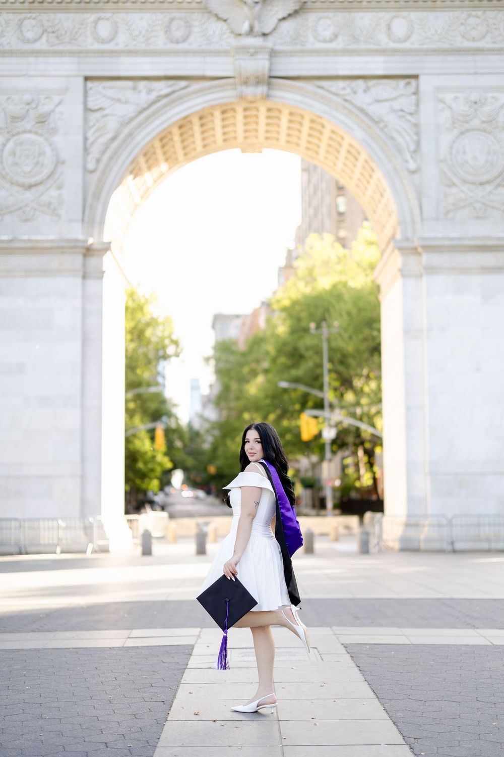 Multiple angles of someone sitting near a grand stone arch entrance with trees visible in the background.