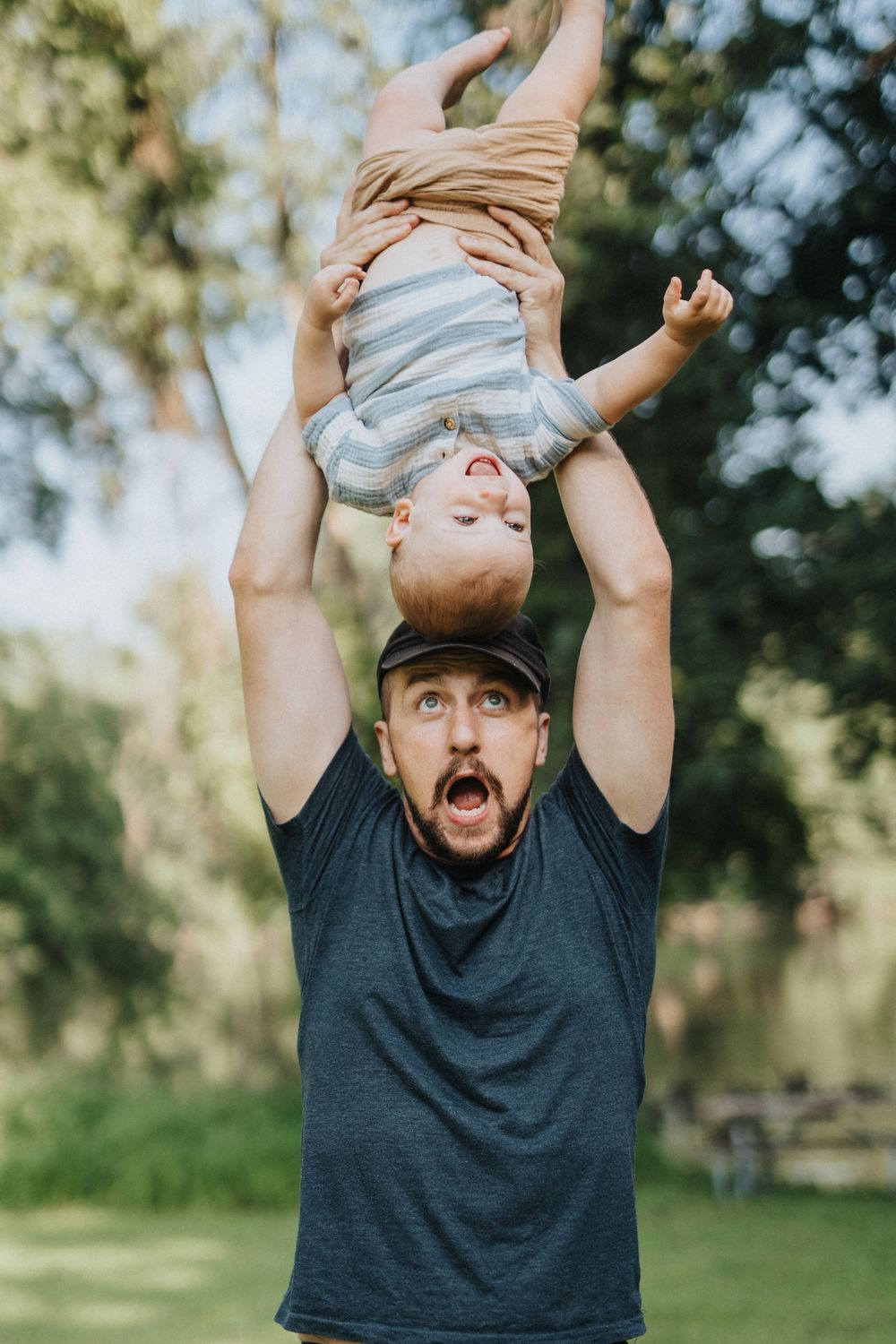 A sequence of photos showing someone playfully lifting and tossing a small child in the air outdoors.