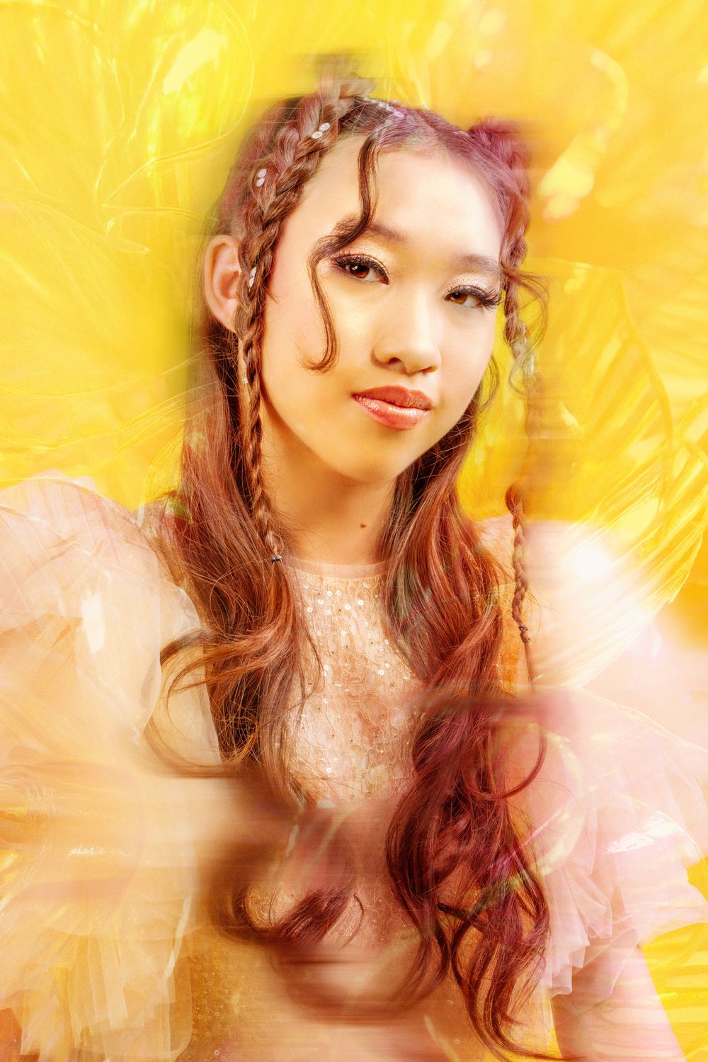 Artistic portrait series with soft yellow lighting and dreamy ethereal effects creates a warm glowing atmosphere.