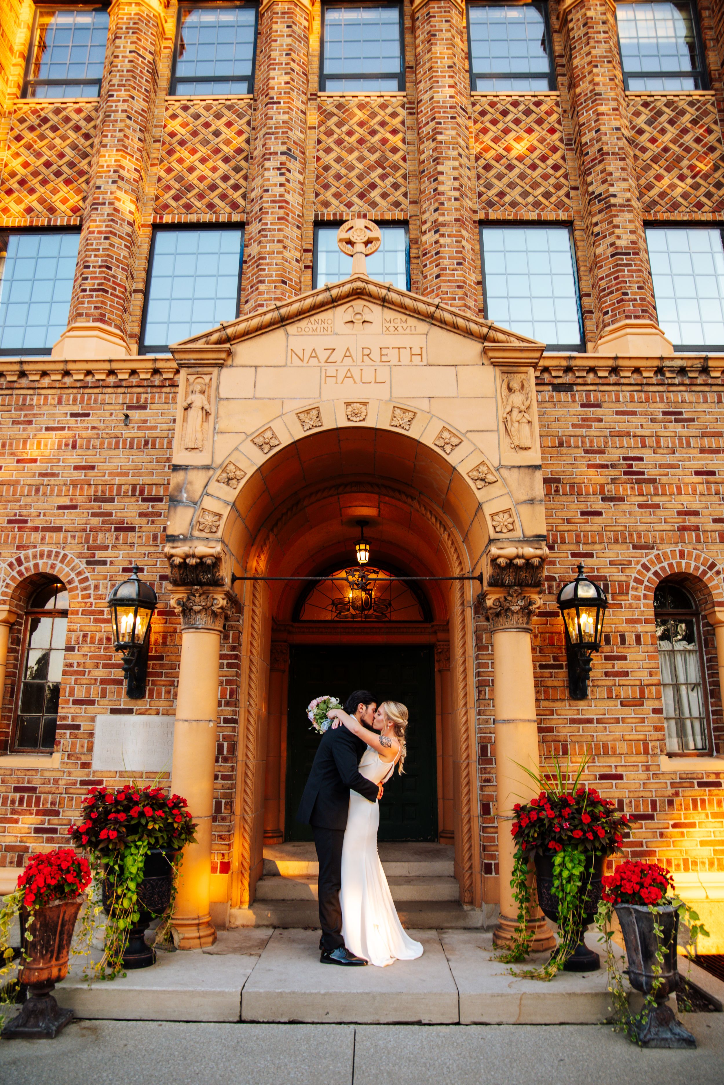 A romantic wedding photo sequence showing a couple in front of the historic brick Nazareth Hall building at sunset.