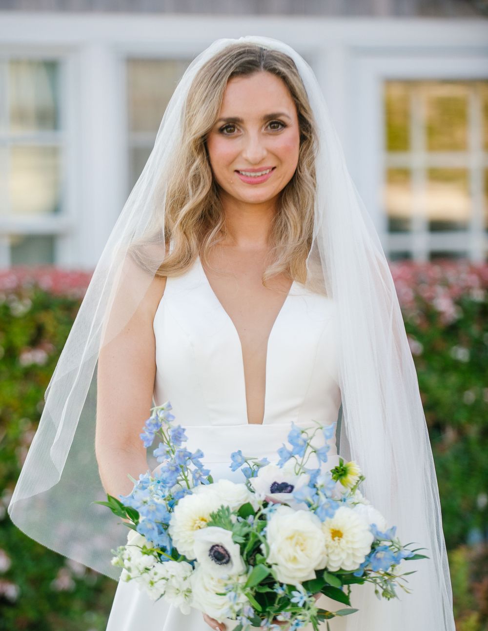 Elegant solo bridal portrait, highlighting the beauty and grace of the bride on her special day