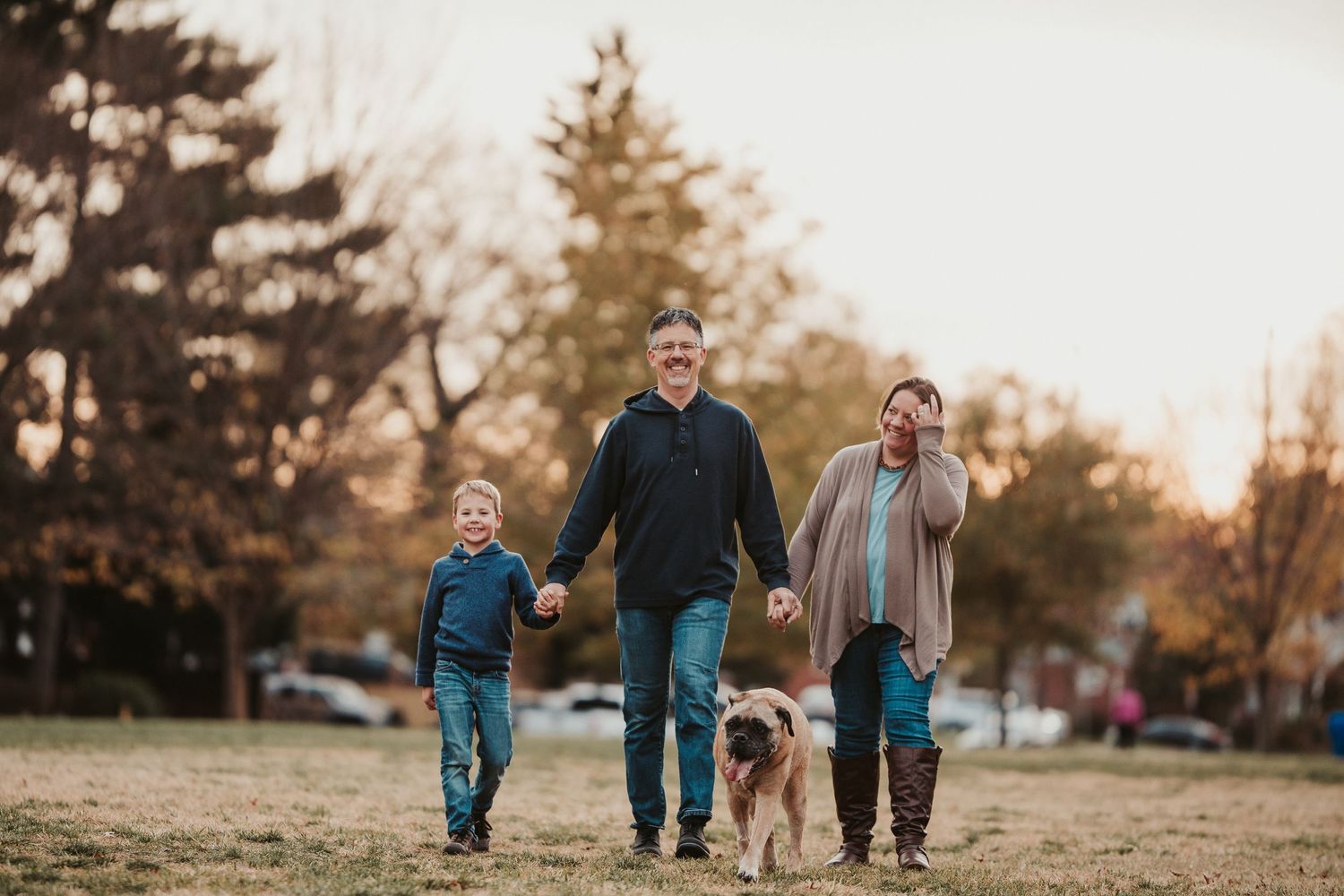 Golden hour family portrait with dog in Wheaton, MD. Photographed by Joey Rushfield of the DMV area.