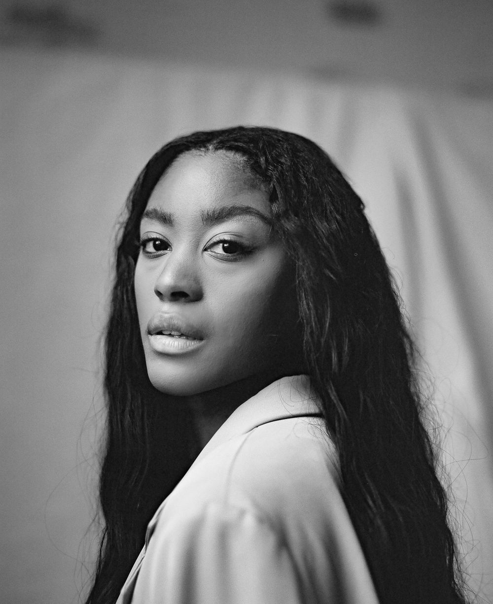 Dramatic close-up black and white portrait with natural makeup look.