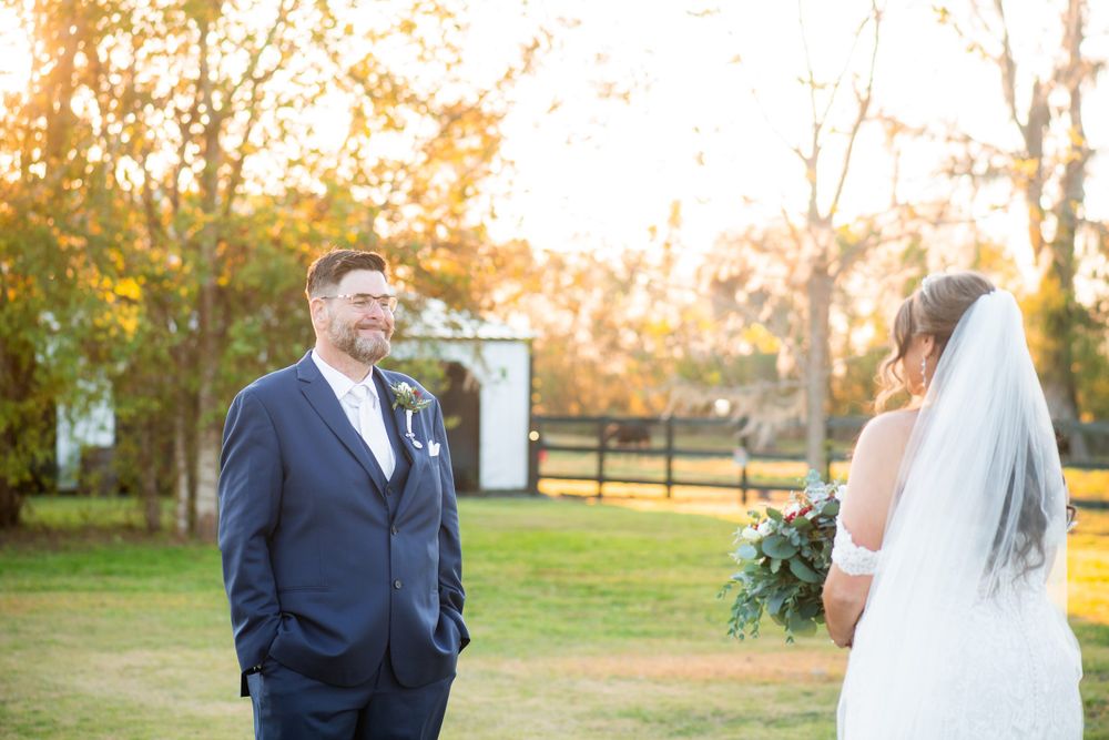 Outdoor wedding portraits captured during golden hour with natural autumn lighting.