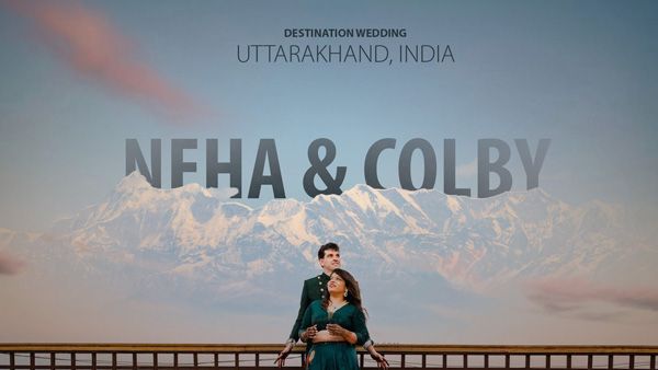 A scenic mountain backdrop frames an engagement announcement photo in Uttarakhand, India.