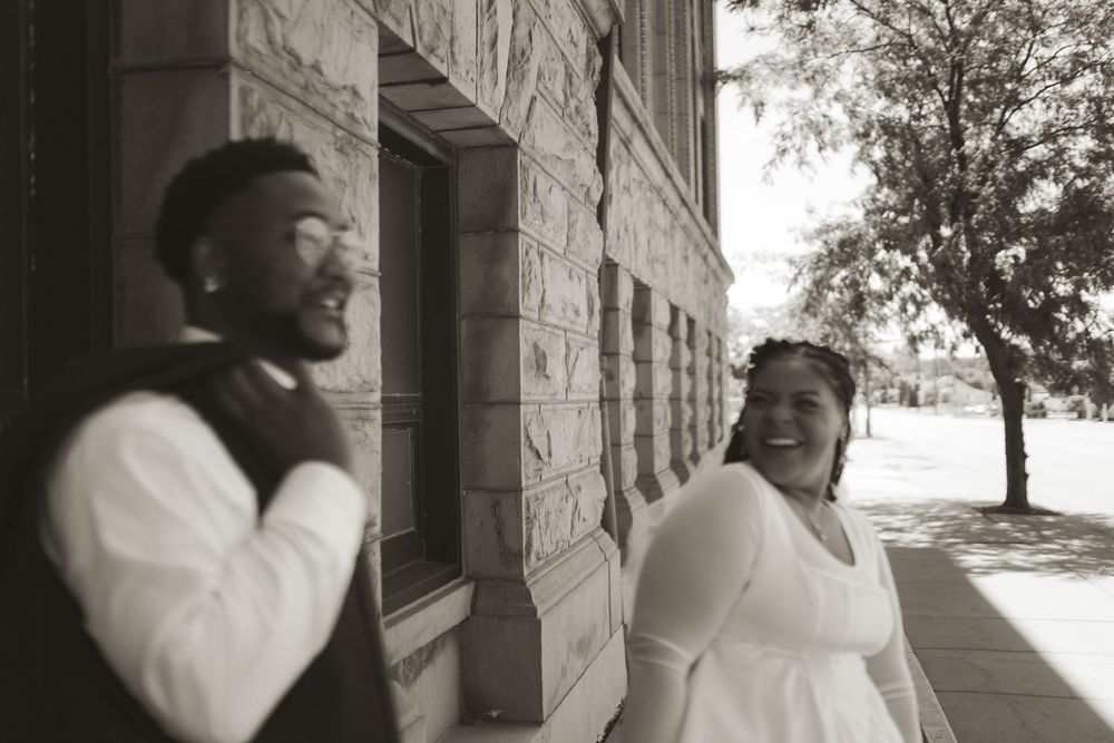 A series of tender moments captured in black and white against an architectural backdrop.