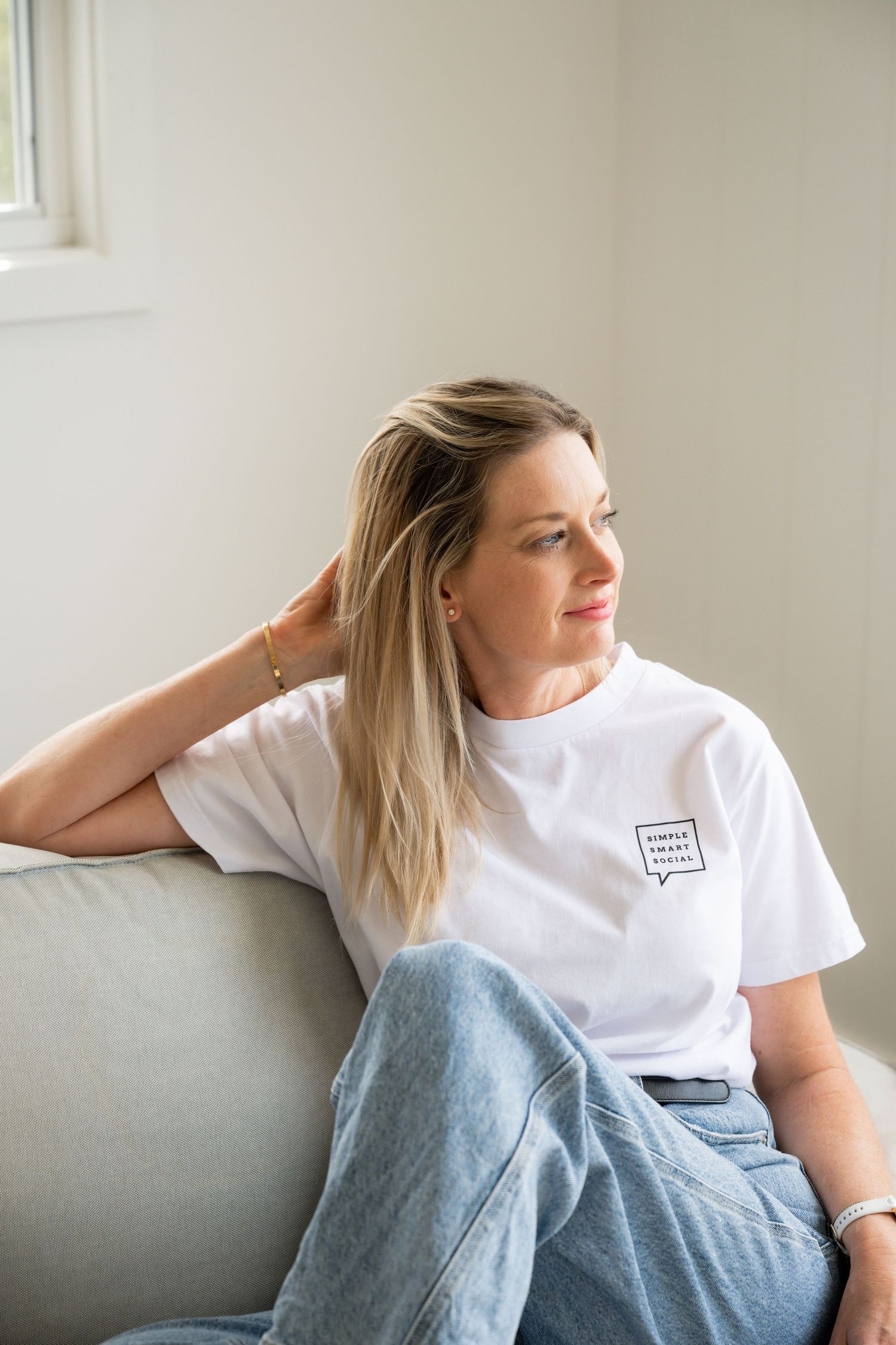 Personal branding photo of a woman in a relaxed home office setting – natural business photography for women in Tweed Heads.