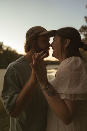 A series of tender moments captured during golden hour in a natural outdoor setting.