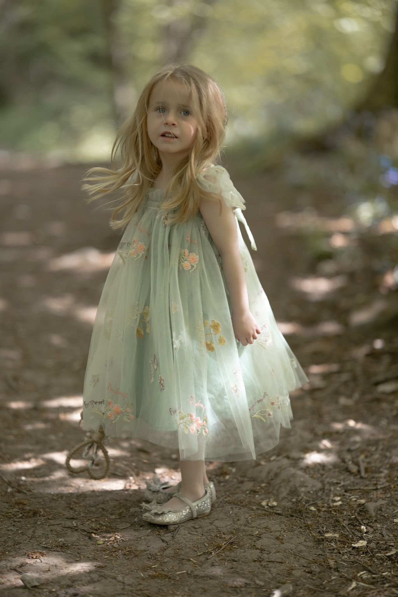 Dreamy children's portrait photo in woodland from outdoor photoshoot. Photographer is Isobel Hughes Photography in Haworth West Yorkshire.