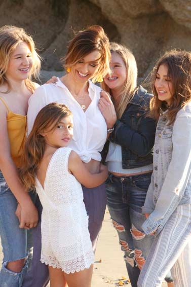 Candid family moment during Orange County portrait session in Monarch Beach, California