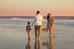 Candid family moment during Orange County portrait session on Balboa Island, California