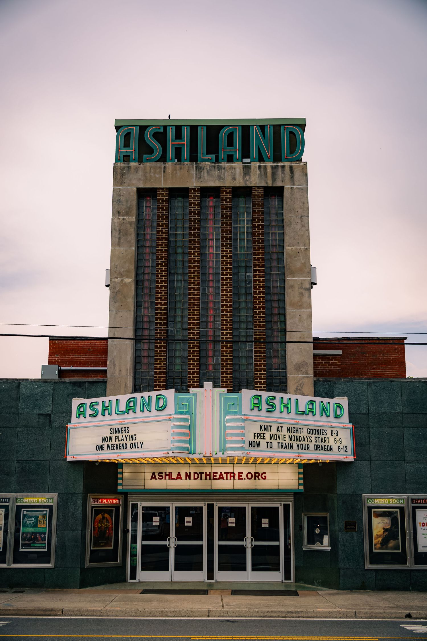 A vintage art deco movie theater facade with 'Ashland' signage shown from different angles in multiple connected photos.