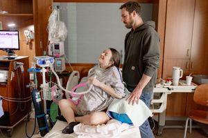 Mom laboring during birth photography session in Marion Indiana