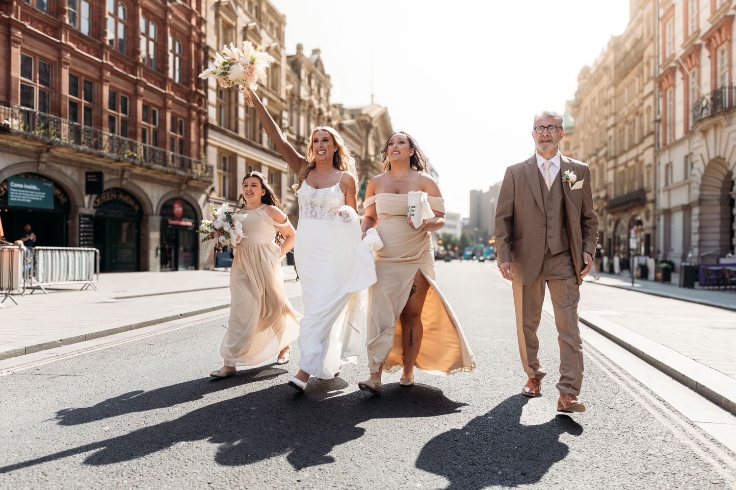 Castle Street, Liverpool. Bride and bridal party walking up to Liverpool town hall to get married.