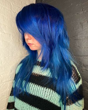 Blue Emo style Fashion Mullet haircut and color done by Angelis