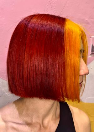 Red and yellow blunt bob done by Angelis