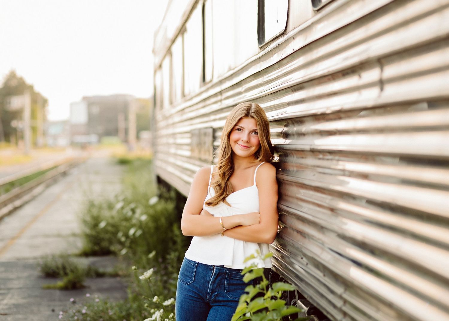 Industrial style photo shoot location with metal siding and natural lighting.