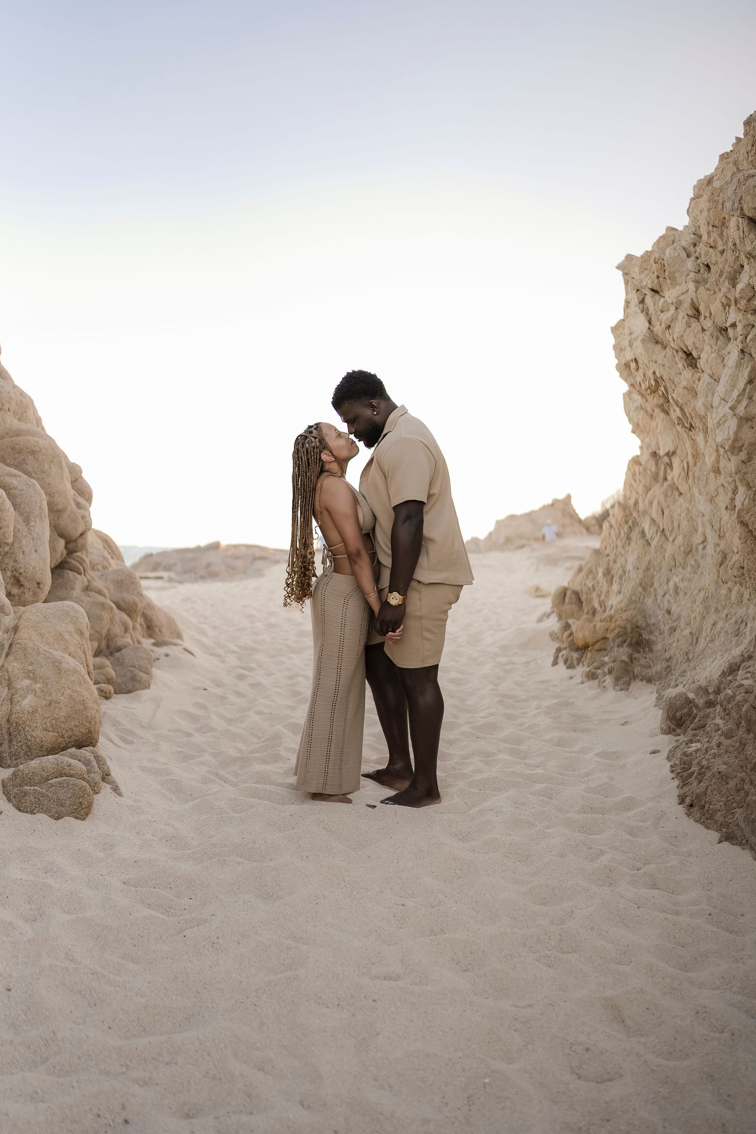 Romantic wedding kiss with ocean view in Cabo San Lucas