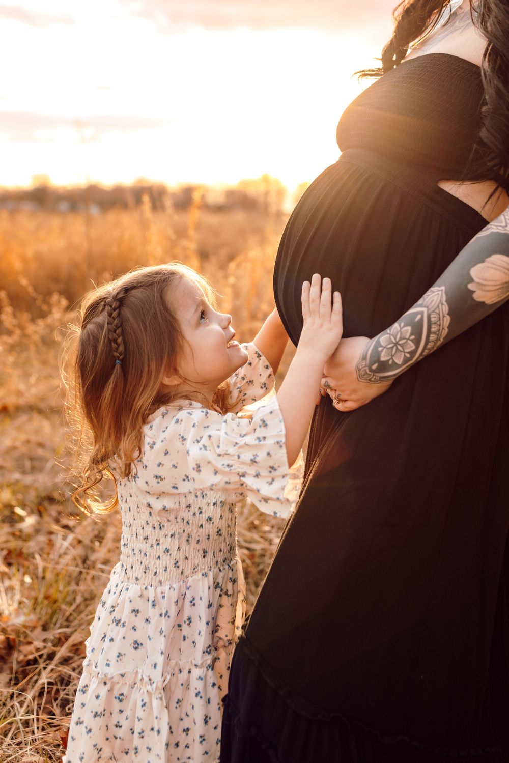 Mommy and big sister portrait during maternity photo session in Iron Station NC