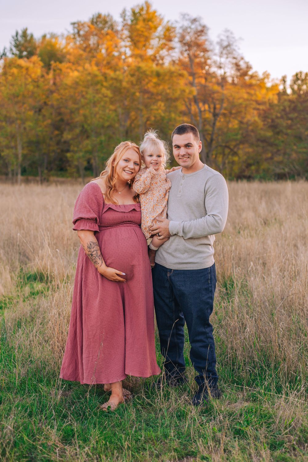A family maternity photo session in a golden autumn field at sunset. Spokane Liberty Lake Photographer Senior Photographer