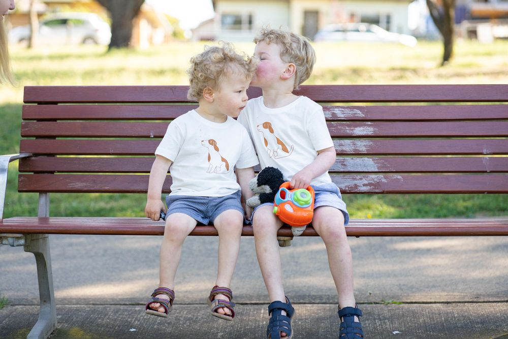 two brothers sharing a cute moment