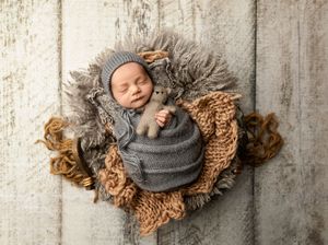 NH Newborn Photographer New Hampshire Newborn Photographer NH Photographer newborn in basket in studio