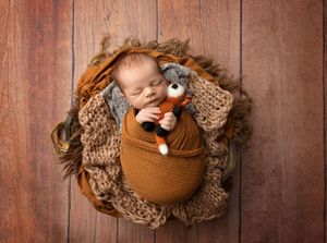 NH Newborn Photographer New Hampshire Newborn Photographer NH Photographer newborn with fox stuffie in studio