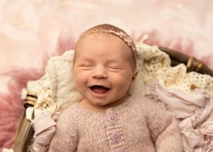 NH Newborn Photographer New Hampshire Newborn Photographer NH Photographer newborn smile in studio