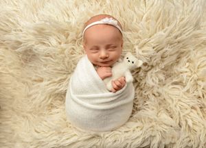 NH Newborn Photographer New Hampshire Newborn Photographer NH Photographer newborn with teddy bear in studio