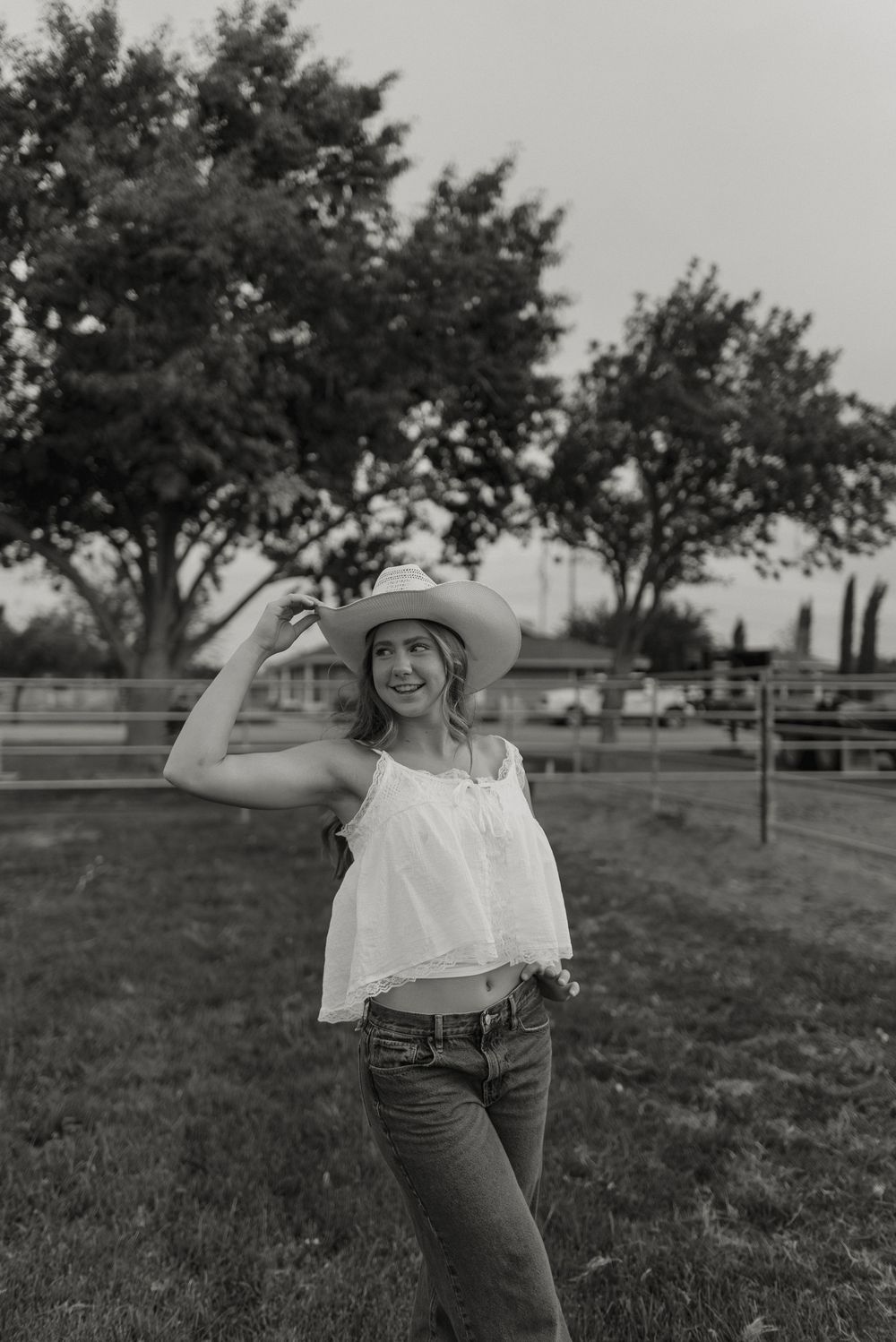 Photo of a high school senior at her western senior photoshoot in Gilbert, Arizona.
