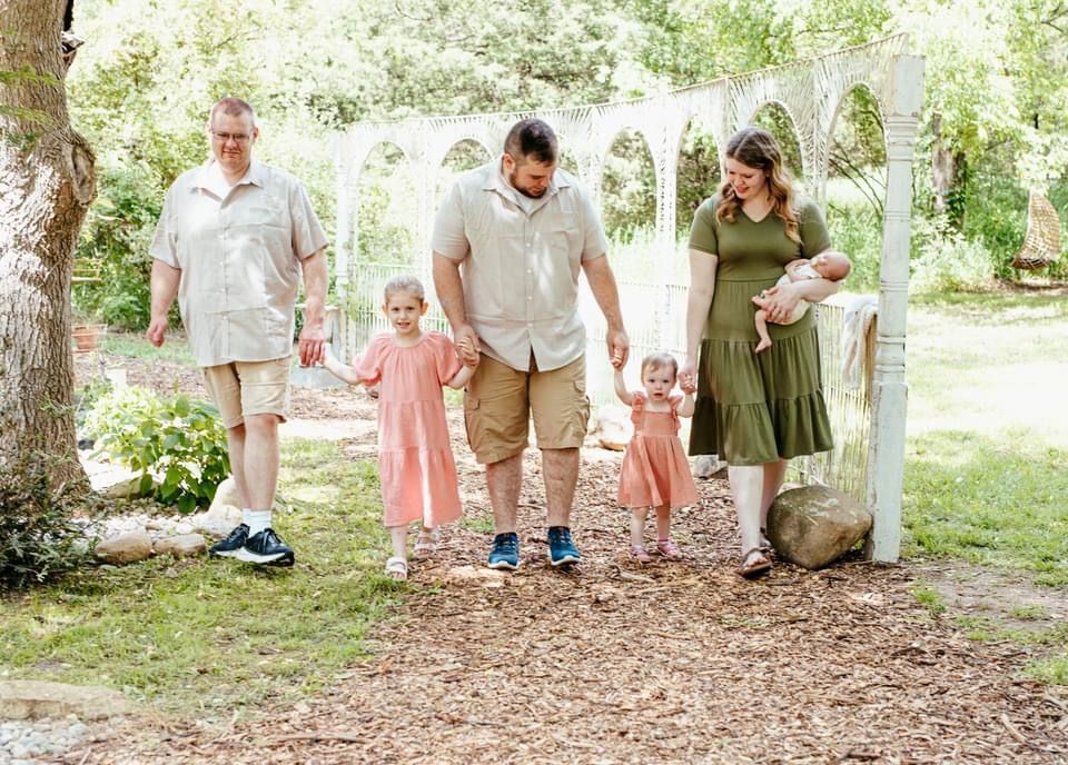 Outdoor photo sequence under trees with white garden structures visible.