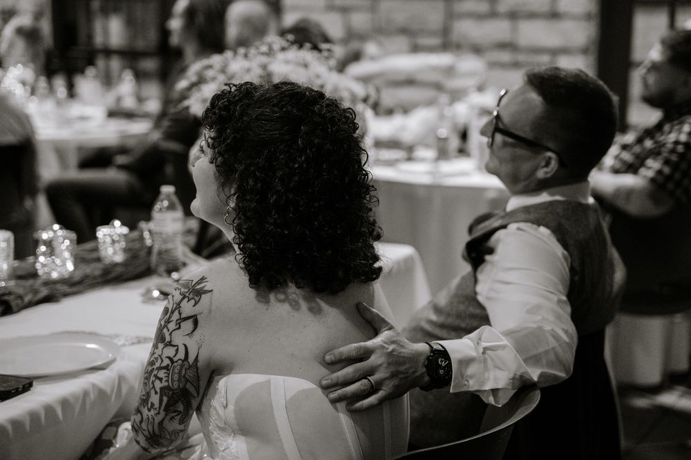 A black and white photo collage shows people celebrating and dancing at what appears to be a wedding reception.